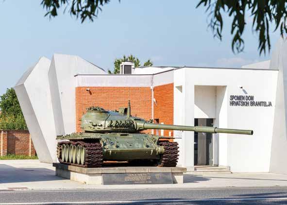 Ispred Spomen doma je tenk kao znak sile koju su slomili hrabri branitelji te bista general-bojnika Blage Zadre, junaka grada Vukovara koji se borio i vodio branitelje upravo