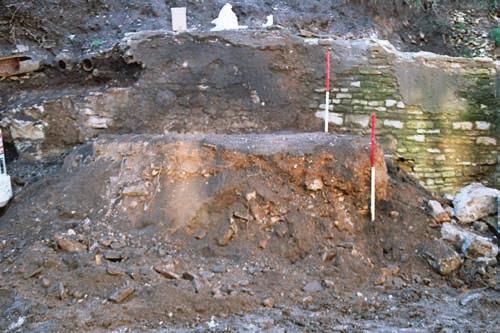 2 A view showing the excavation of the layer of humus in an area of the garden in sectors E and F, and the partially excavated Roman, Late Roman and medieval architectonic elements (walls and ramp) S