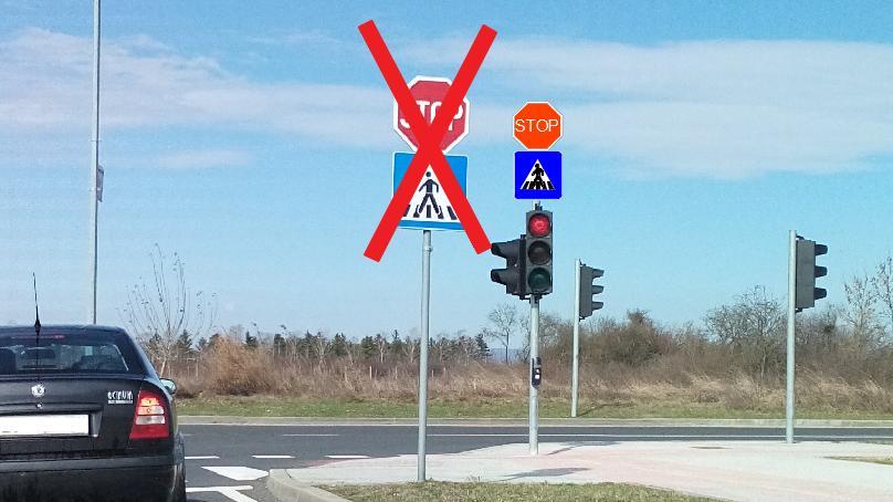 a ne posebno na stup i ispred semafora, jer tako postavljeni prometni znakovi smanjuju