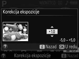 Da biste izabrali vrednost za korekciju ekspozicije, držite E (N) dugme pritisnutim i rotirajte komandni točkić dok se željena vrednost ne izabere u tražilu ili prikazu informacija.